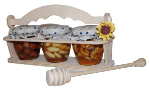 Set von 3 Arten von Nüssen in Honig in einem Gestell